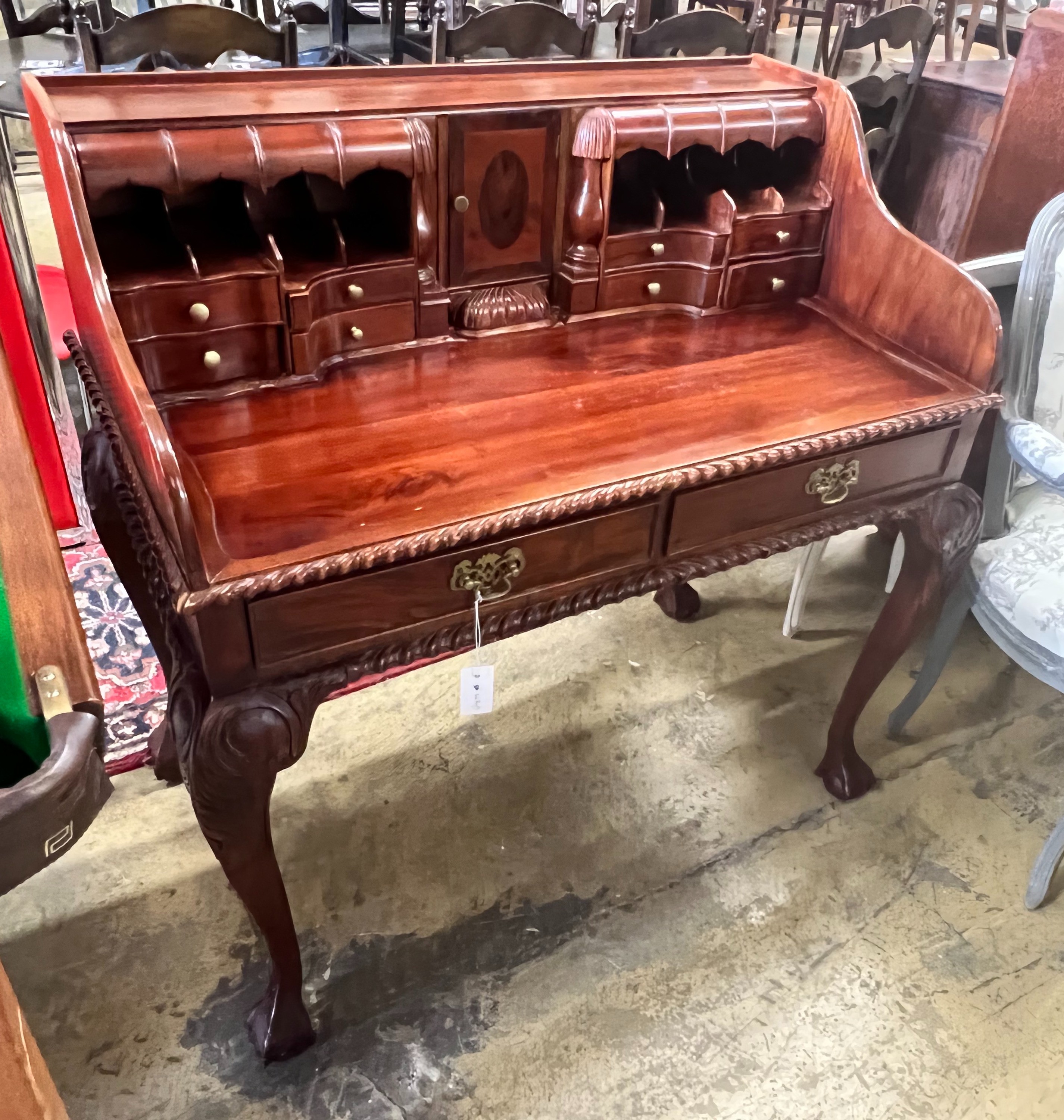 A reproduction George III style mahogany desk, width 103cm depth 60cm height 104cm